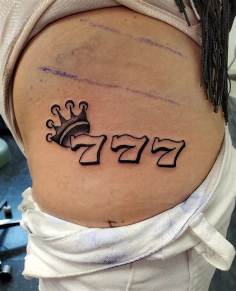 777 tattoo meaning|777 gang tattoo.
